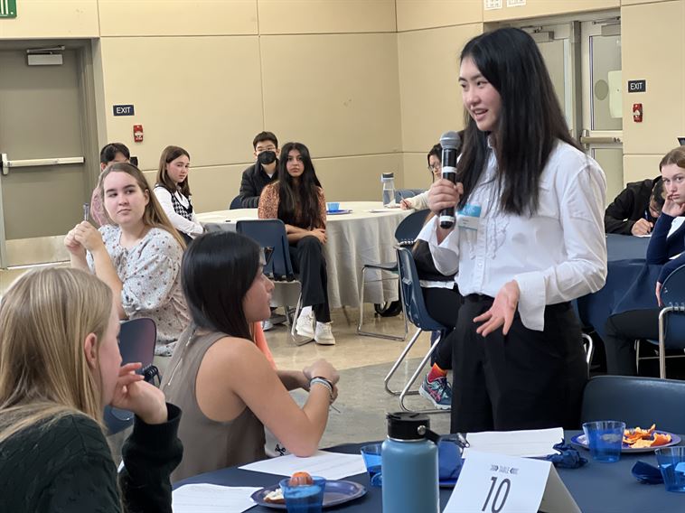 Student speaking with mic